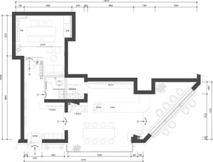 Floor plan of a coffee shop featuring a seating area, counter, and product display