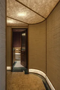 Modern bathroom interior with wooden paneling and tiled floor