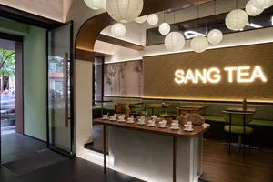 A modern coffee shop interior with minimalist decor and contemporary design.