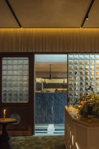 Glass-block and wooden kitchen in a modern restaurant setting