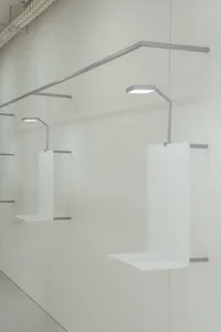 White metal shelves with minimalist design.