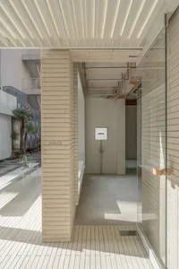 Interior view of a modern retail storefront featuring a glass storefront.