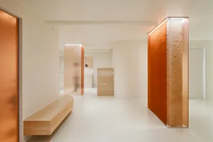 A modern glass corridor with sleek lines and minimalist design.