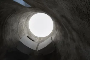 A circular view of a concrete interior design.