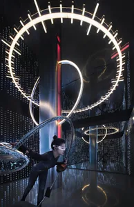A person performing in a modern artistic space with metallic elements and circular light fixtures.