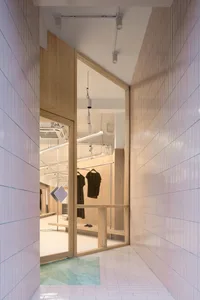 Modern retail shop interior featuring wooden elements.