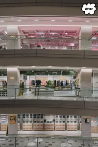 A modern retail store with concrete and glass materials.