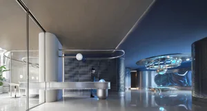 A sleek modern lobby with metallic finishes and blue lighting.