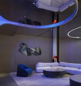 Modern residential interior with textured fabric and leather finishes.
