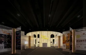 A minimalist retail store interior with transparent glass walls.