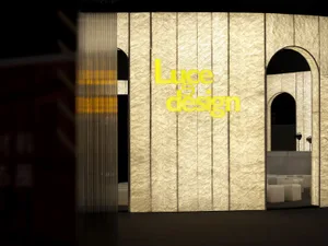 A textured paper facade with the words "Luce Design" on it.
