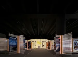 An exhibition featuring modern lighting design using transparent panels.