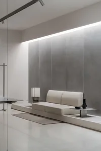 A minimalist living room with a concrete wall and sofa, minimalistic design.
