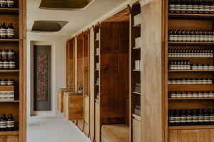 Modern spa interior featuring minimalist design and wooden panels.