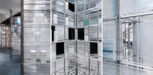 Abstract retail space with metal shelves wrapped in transparent plastic, creating a visually striking and modern display.
