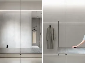 Clothing retail space featuring metallic finishes in minimalist design