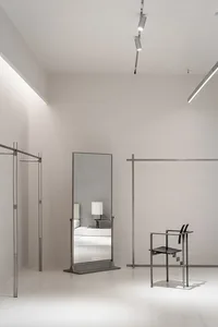 A modern storefront with metal frames and glass panels.