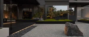 Modern landscape design featuring concrete elements and plants.