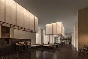 Modern restaurant interior with wooden walls, leather seating, and metallic accents.