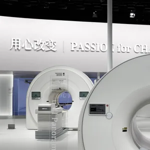 PET-CT scanner exhibit with white materials, showcasing advanced imaging technology for medical diagnostics.