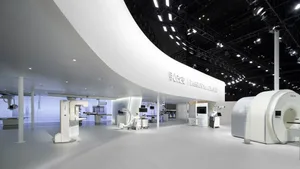 A minimalistic medical exhibition with white materials and modern design.