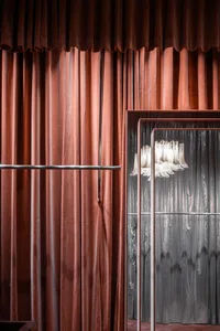Modern storefront featuring a sleek, minimalist design with a striking ceramic facade.