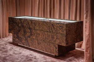 A modern interior display case with a laminated board surface overlaid with a veneer finish.