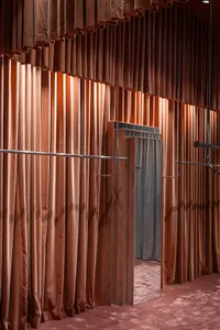 A clothing store with a velvety interior design.