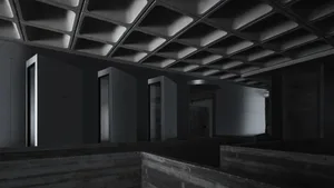 An industrial office space with concrete and metal materials.