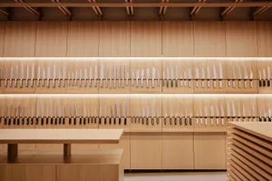 A collection of knives displayed in a modern kitchen setting.