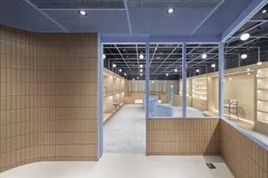 Minimalist retail storefront with wooden features
