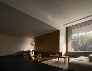Modern minimalist living room featuring wooden elements and natural light.
