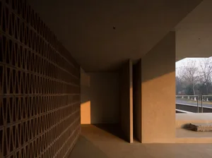 Modern brick interior with concrete floors and walls, minimalist design