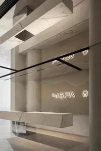 Modern spa interior featuring marble materials and minimalist design