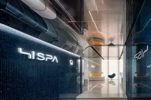 Modern spa interior with glass walls and concrete finish