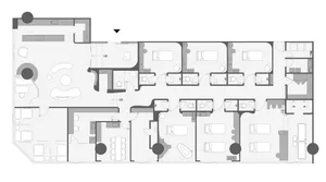 A detailed 2D architectural drawing of a hospital floor plan, showing rooms, corridors, and structural elements.