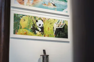 Illustration of a panda in a colorful forest