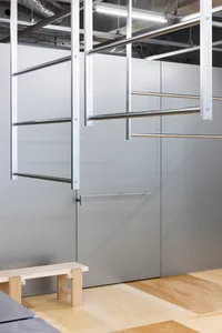 Modern industrial office space featuring metal and wood elements