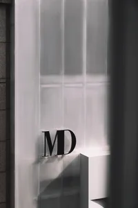 Glass window with a white wall and horizontal lines