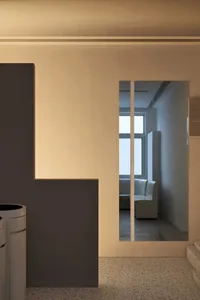 Modern minimalist interior with concrete walls and floor.