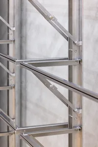 A modern industrial building features a steel frame structure.