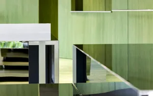A sleek, modern office space with shiny metallic elements.