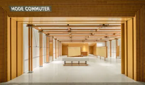 Modern retail storefront with wood panels and white flooring