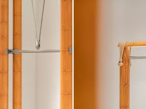 Close-up of a bamboo furniture hanger with metal components