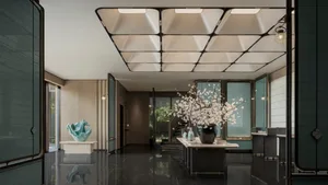 A modern lobby featuring metallic, glass, and marble materials.