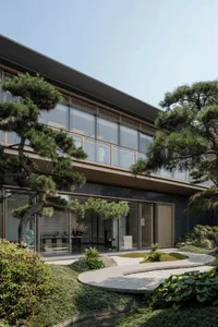 Modern residential exterior with glass walls, concrete floor, and pine trees