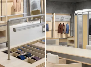 Modern retail clothing store with wooden shelves and railings