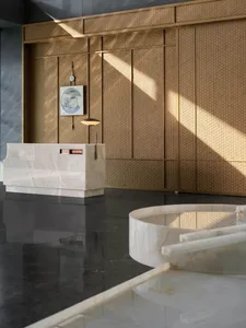 A modern retail storefront featuring transparent glass walls and a minimalist design.