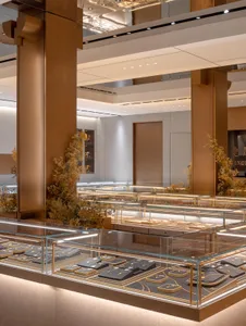 Modern jewelry retail store display featuring glass cabinets.