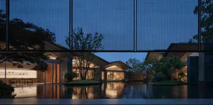 Modern residential interior with concrete and glass materials